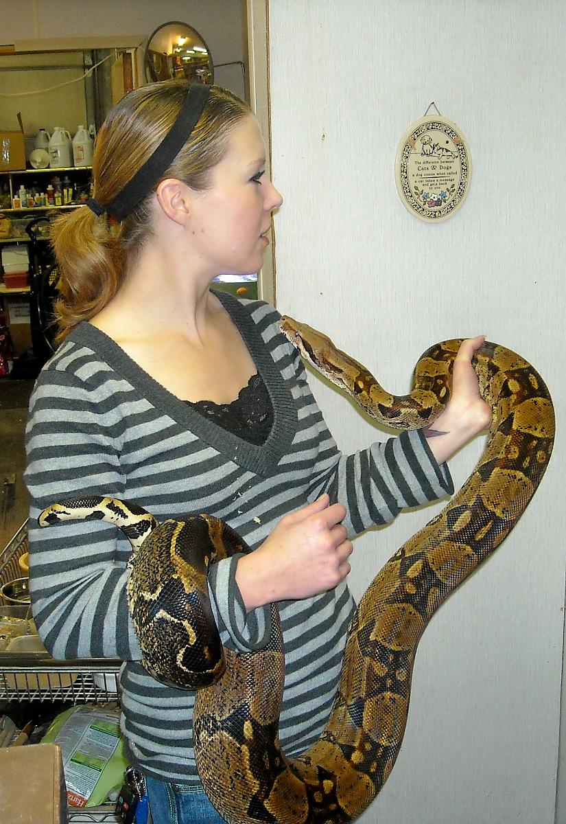 Me and an 8 ft Red Tailed Boa