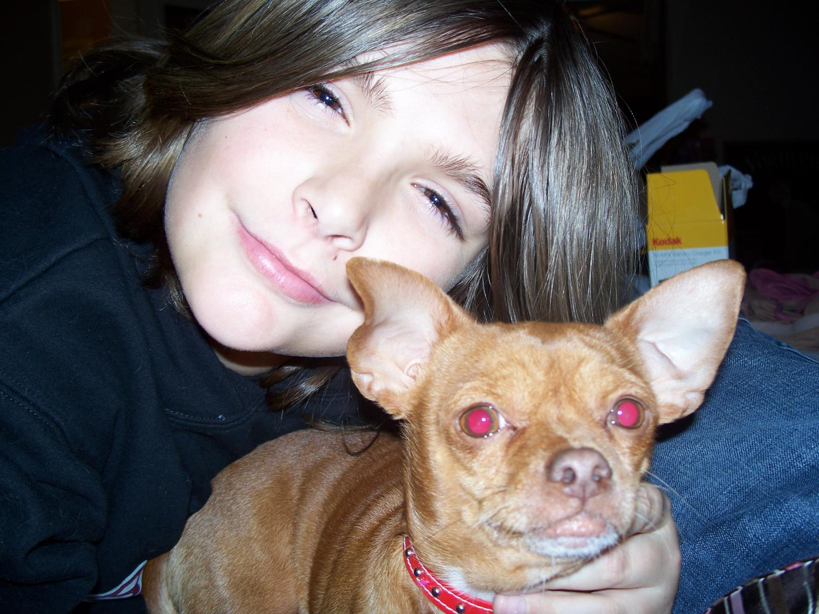 My son and our little chihuahua "Leo"